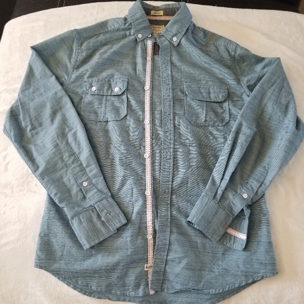Light blue dressed shirt. Size small